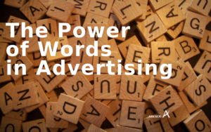 The power of words in advertising over a pile of Scrabble tiles